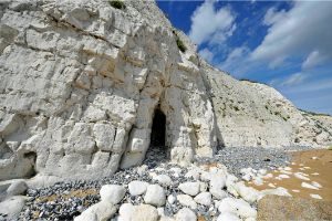 Chalk cliffs with an entrance