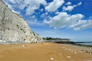 View of the cliffs and the sandy bay