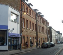 The outside view of the refurbished red-brick building