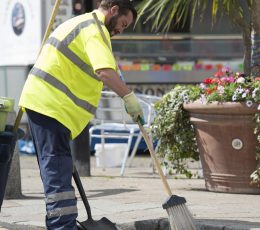 Street Cleansing worker sweeping street