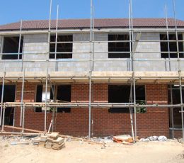 Houses during construction before windows and doors