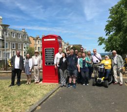Unveiling of interpretation panel in Dalby Square gardens.