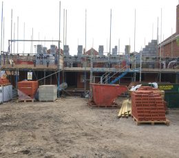 Scaffolding around houses being built