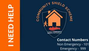 Front of the Community Shield business card showing the logo and contact numbers for the emergency and non emergency phone numbers