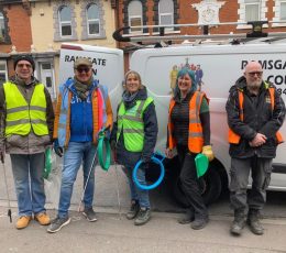 Group of volunteers ready to collect litter