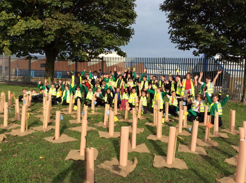 Children from St Laurence-in-Thanet CE Junior Academy with the mini-woodland in Warre Recreation Ground
