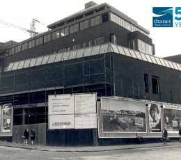 an old image of the Thanet Gateway building on Cecil Square under construction, with a special edition of the council's logo to commemorate the council's 50th anniversary