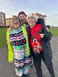 A group of smiling volunteers