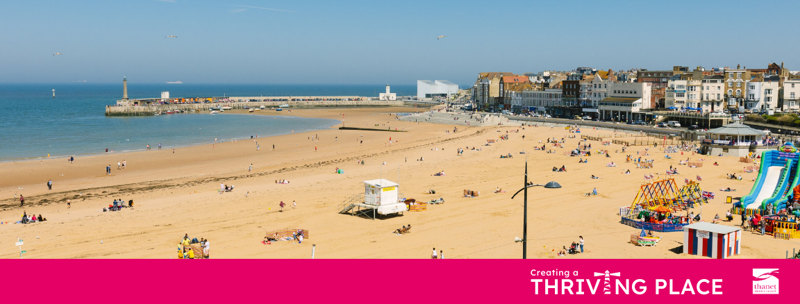 A panoramic view of a sunny, busy beach in Thanet with people relaxing on the sand and swimming. A bright pink banner across the bottom reads 'Creating a THRIVING PLACE' featuring a stylized lighthouse icon and the Thanet District Council logo.