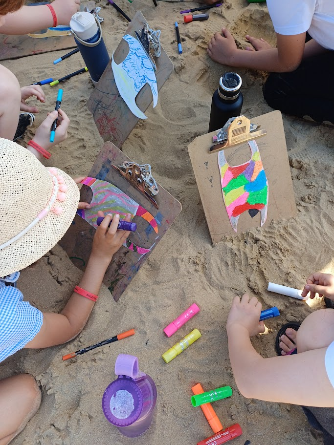 Children taking part in a beach workshop